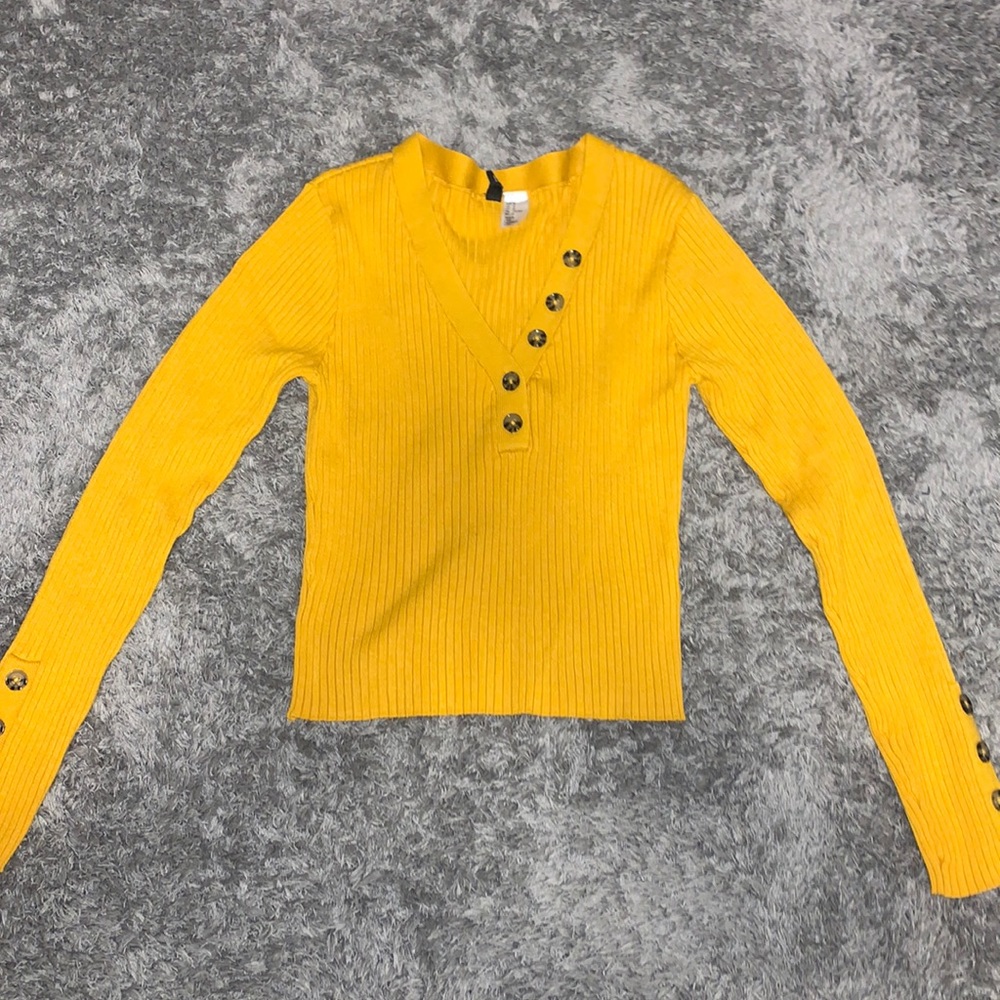 V-neck golden yellow sweater